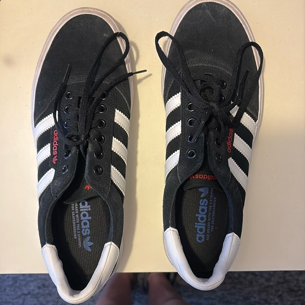 Adidas  men’s black and white sneakers size US 9 1/2